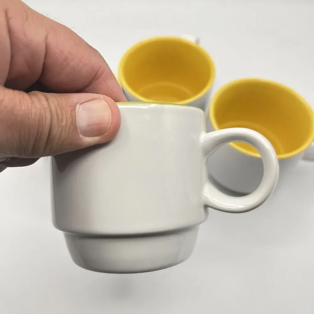 Crate and Barrel Stackable Cups Mugs White with 1 Green and 3 Yellow inside